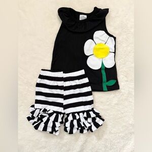 Black and White Striped Outfit with Flower Design